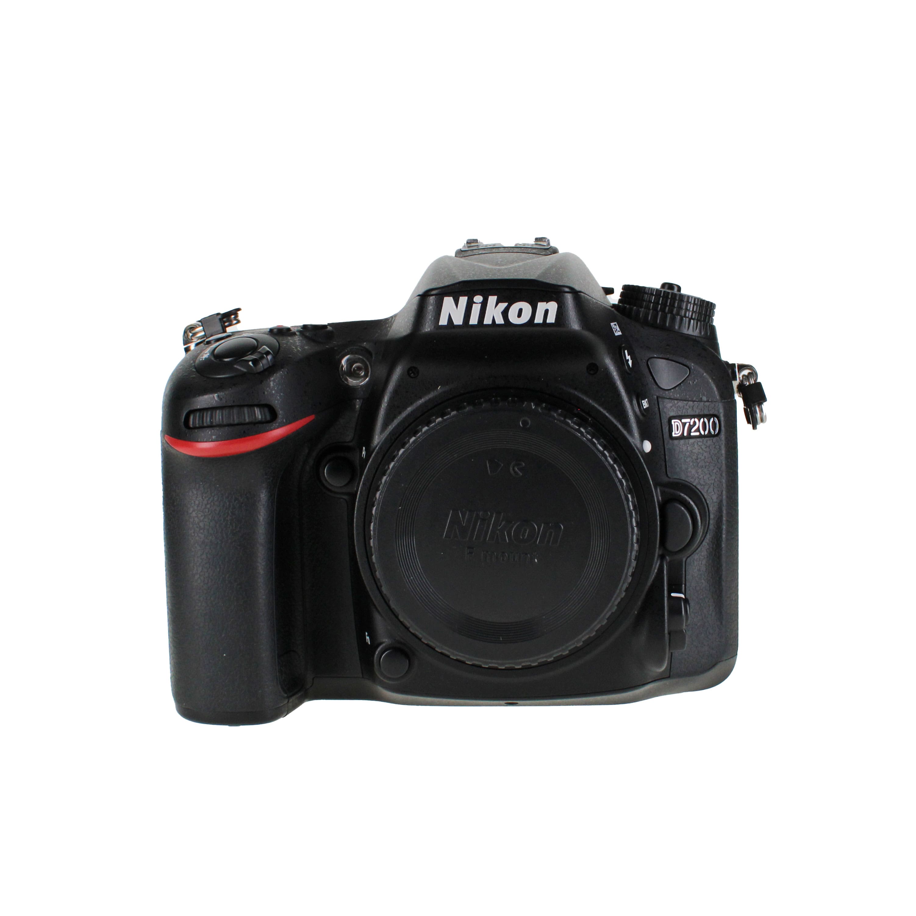 Nikon D7200 Digital Camera with lens and accessories on a table