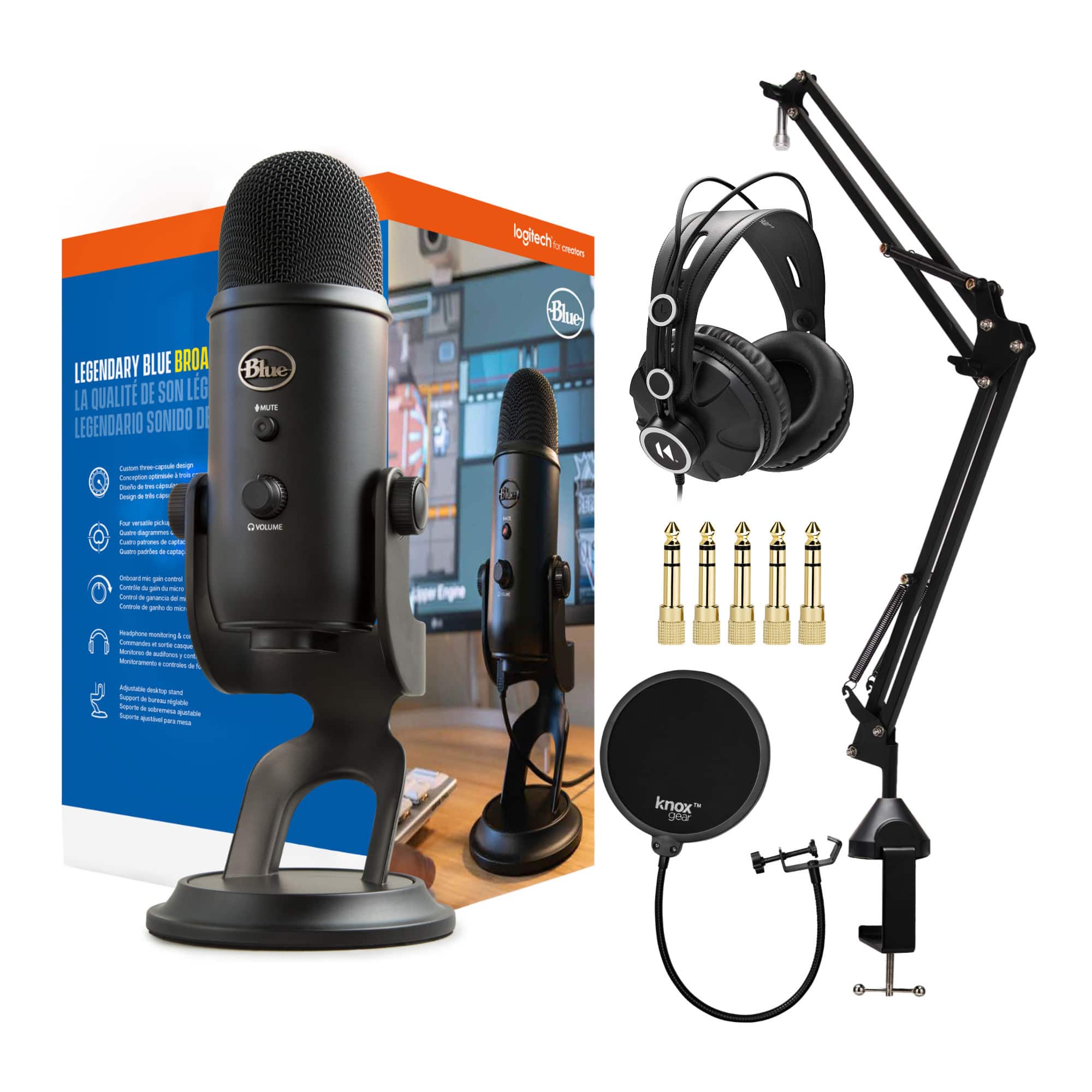 'Professional USB microphone setup on a desk with headphones'